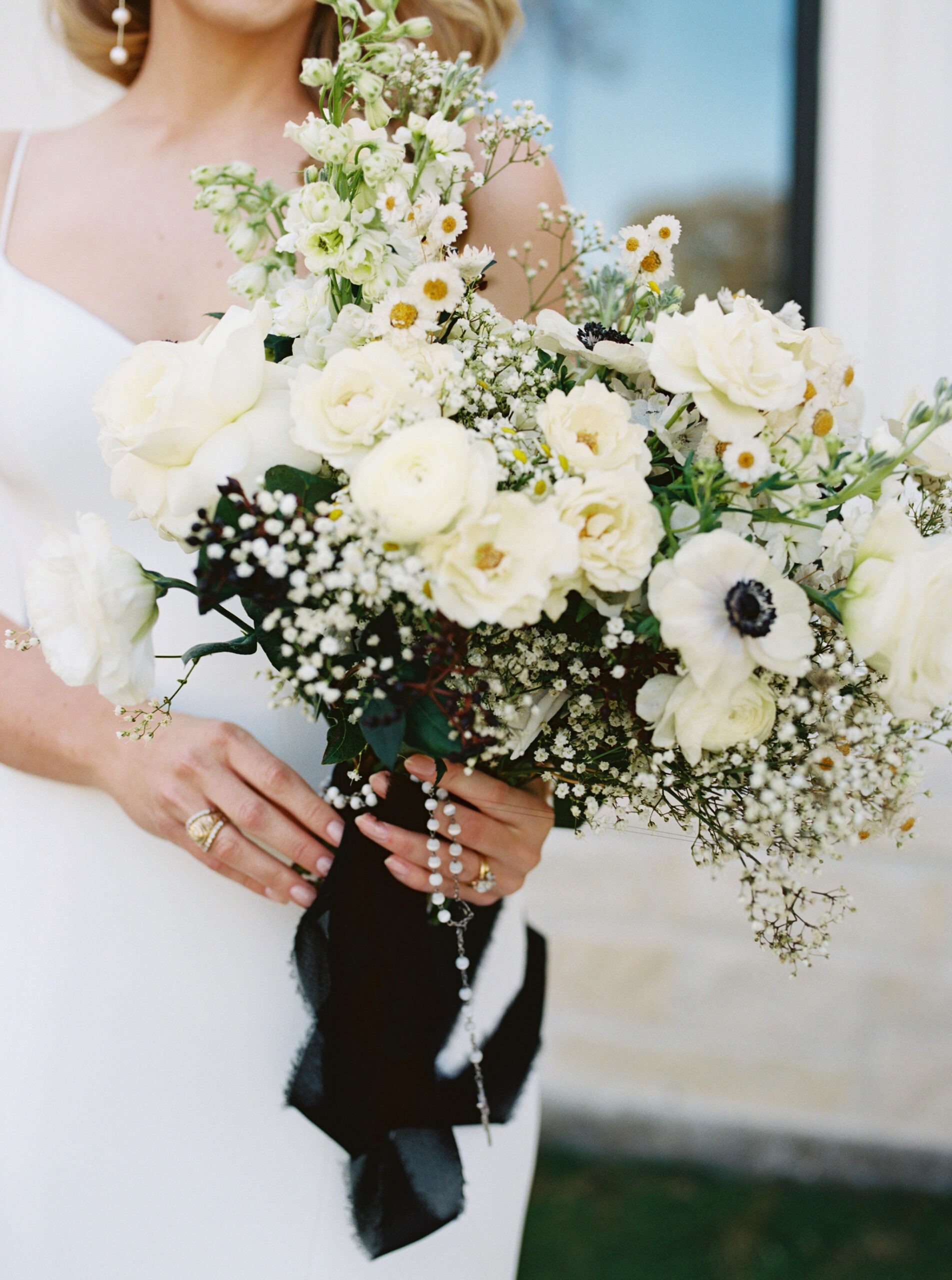 Bridal bouquet with white floral arrangement