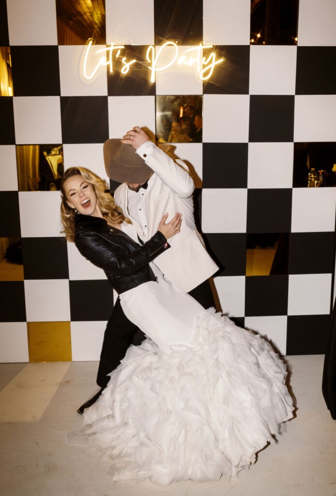 Bride and groom dancing at wedding reception